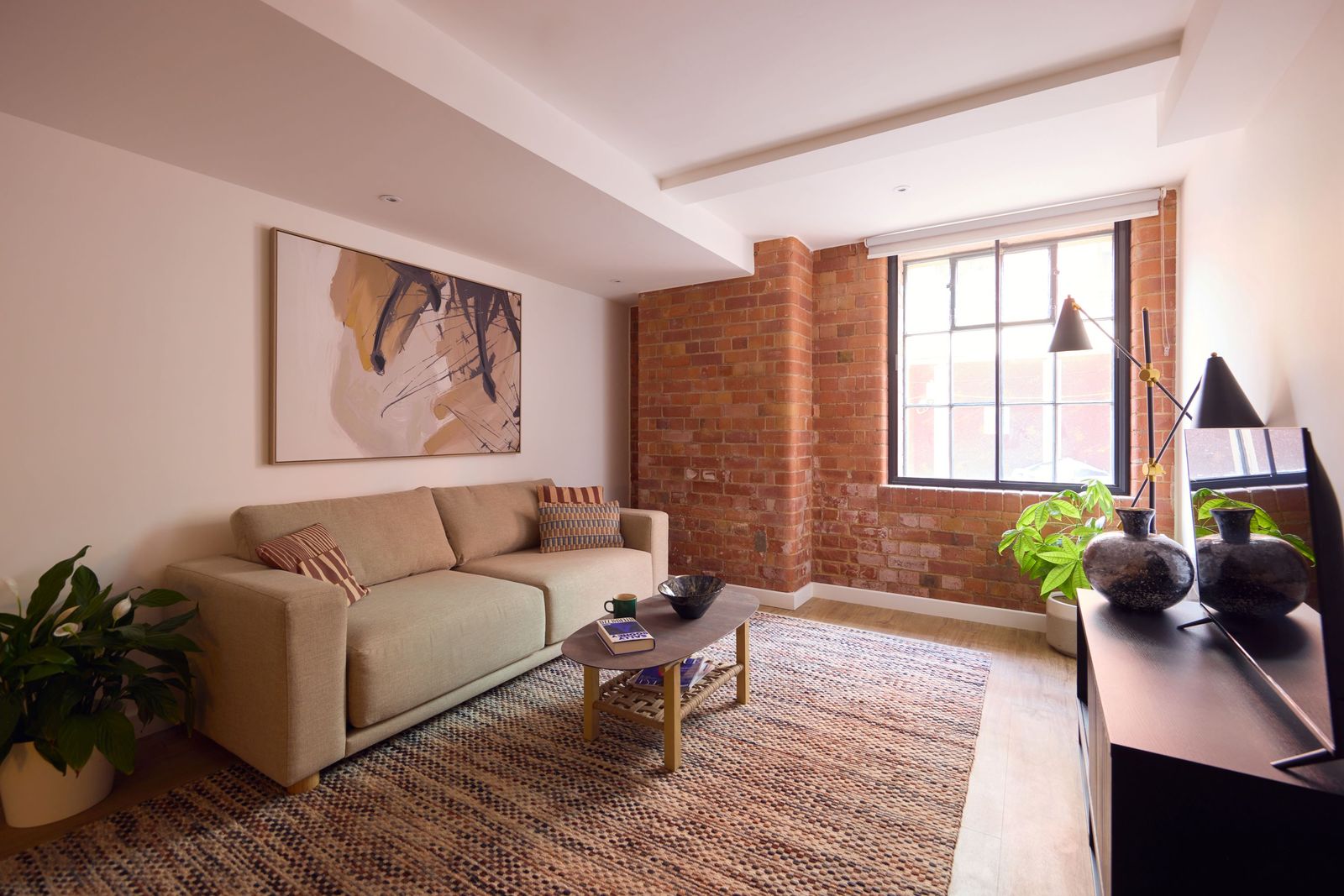 Living Room with Exposed Brick Wall
